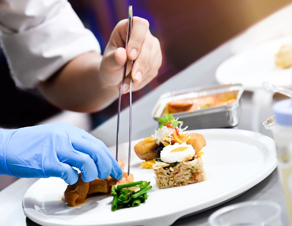 Private chef preparing dish
