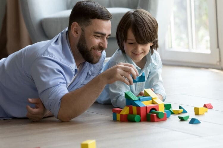 Father and son building a tower